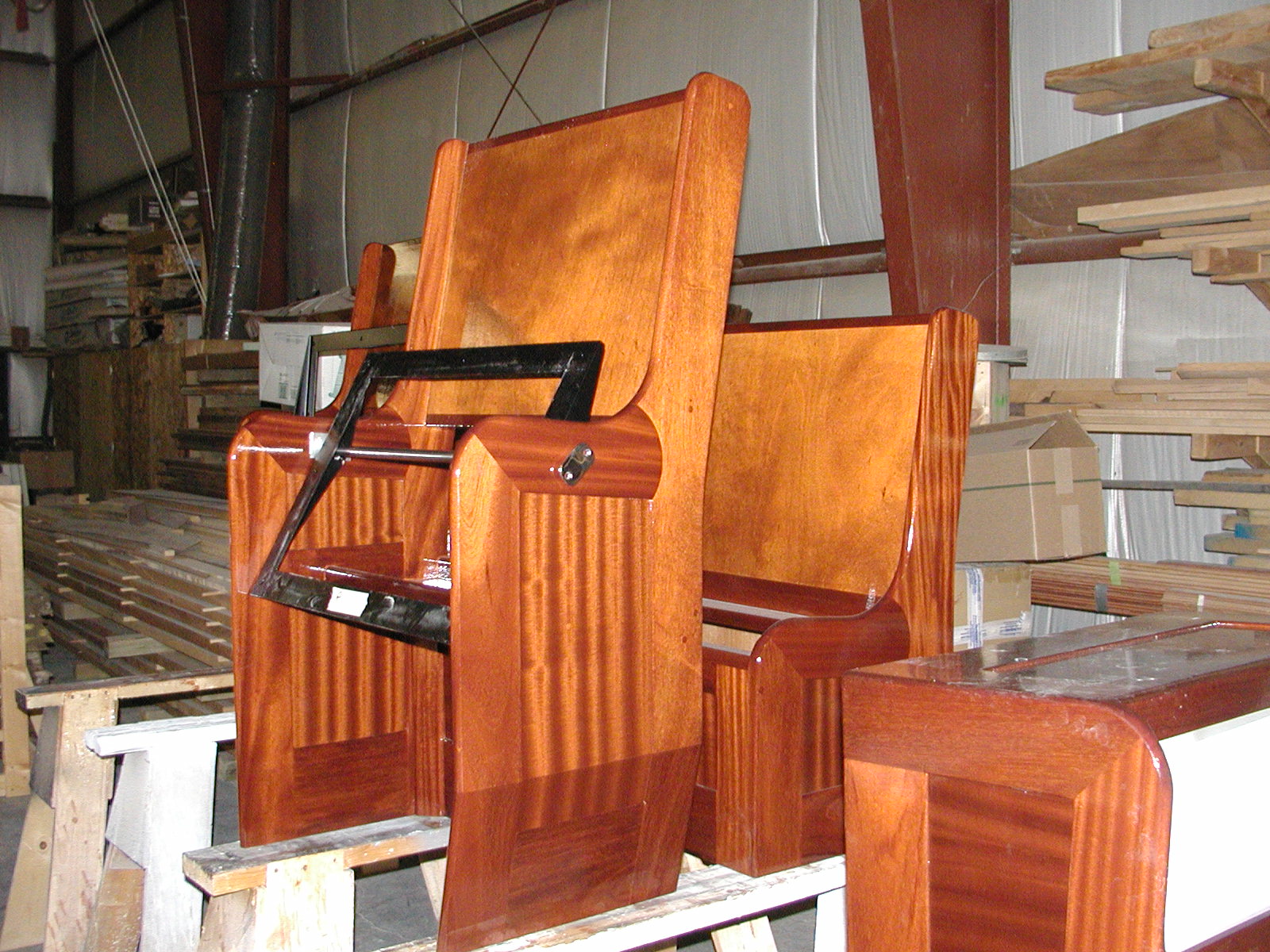 Custom mahogany woodworking on seating